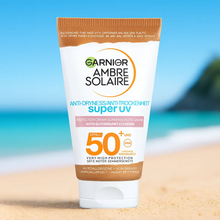 Charger l'image dans la galerie, Garnier Ambre Solaire Crème Protection Anti-Dessèchement Super UV SPF50+ 50 ml GARNIER