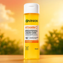 Charger l&#39;image dans la galerie, Garnier SN Soin Liquide Éclaircissant à la Vitamine C, Esencja do twarzy 120ML GARNIER
