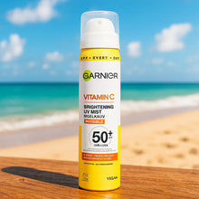 Charger l&#39;image dans la galerie, Garnier Vitamine C Éclaircissante sur le maquillage Brume UV Invisible avec SPF50+ et Vitamine C 75ml GARNIER
